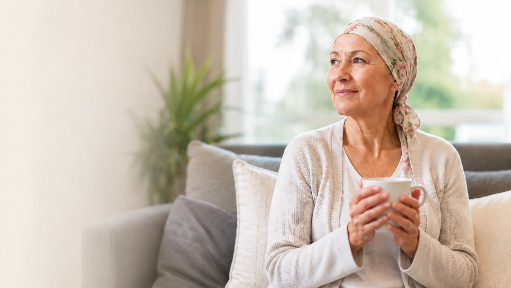 A cancer survivor at home, finding a moment of calm and hope